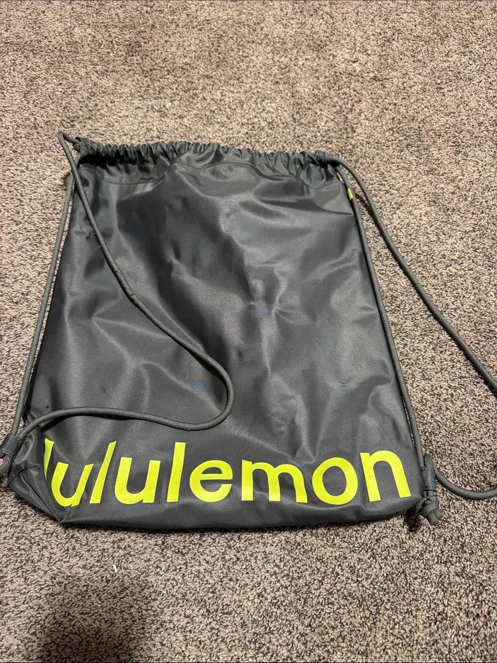 lululemon athletica Black Drawstring Backpack with Neon Yellow Logo